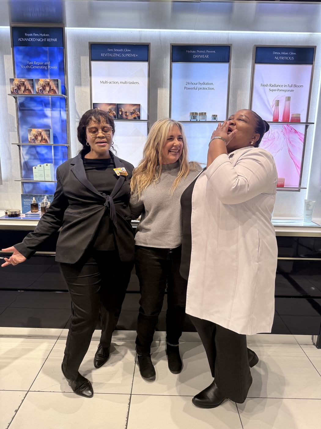 Shareen Richter laughing with two colleagues after a workplace session